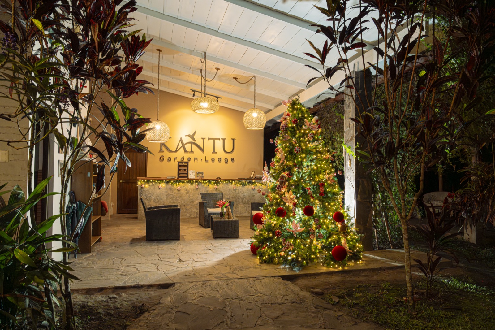 Christmas at the Kantu Garden Lodge reception — tree by the front desk