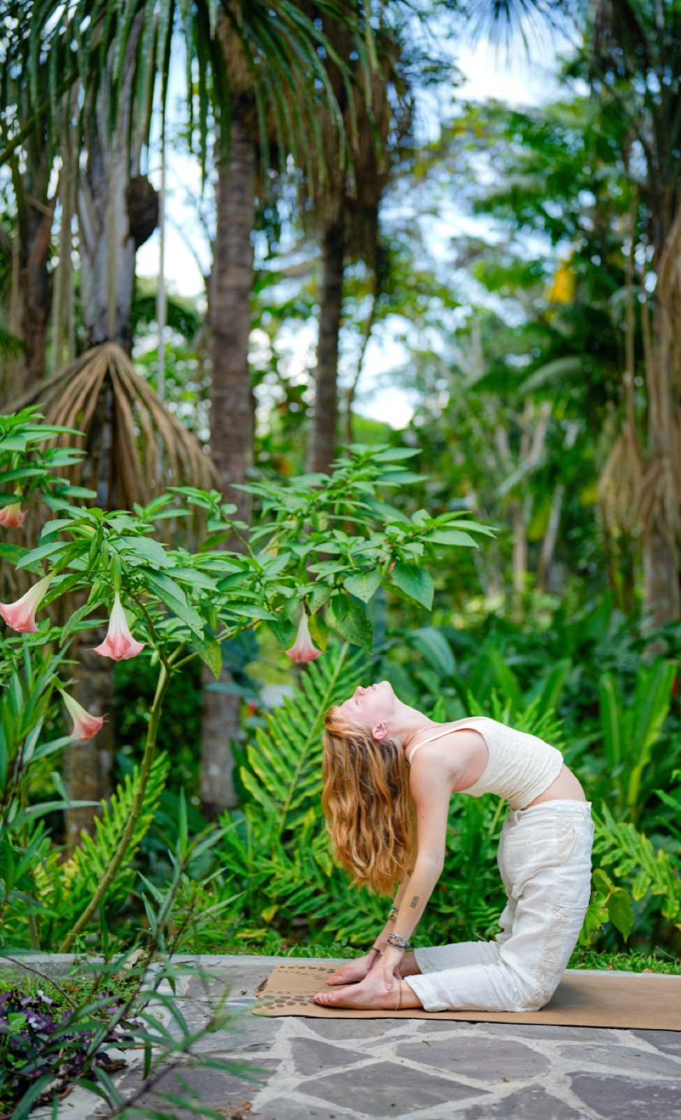 Vinyasa practice in the garden at Kantu Garden Lodge