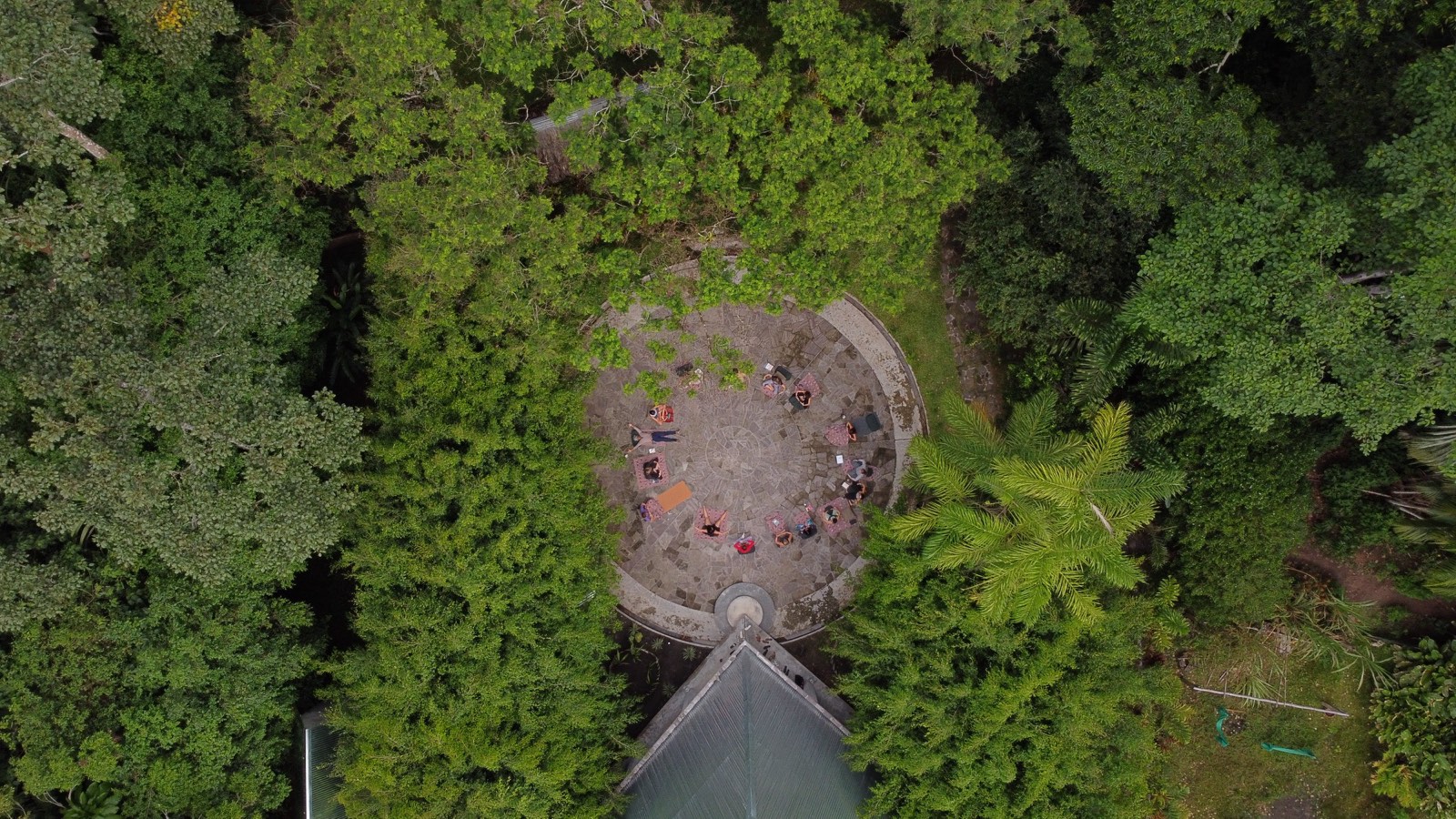 Circular stone outdoor yoga platform at Kantu